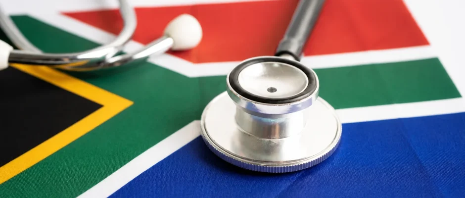 Stethoscope on a South African flag representing healthcare jobs under the Critical Skills Visa Image title: South Africa Critical Skills Visa Healthcare Jobs 2026
